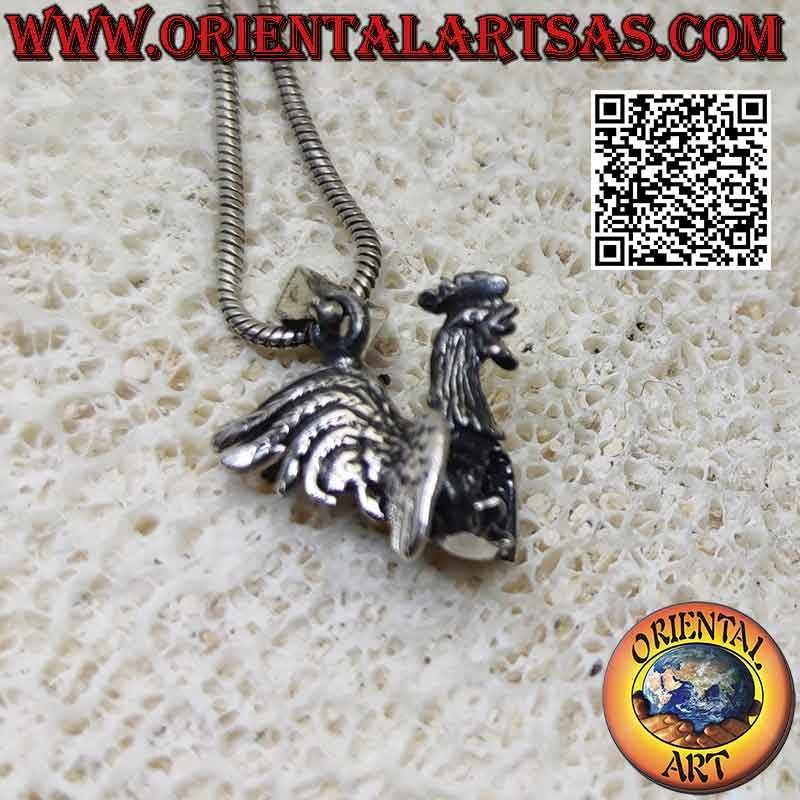 Silver pendant in the shape of a walking rooster (three-dimensional)