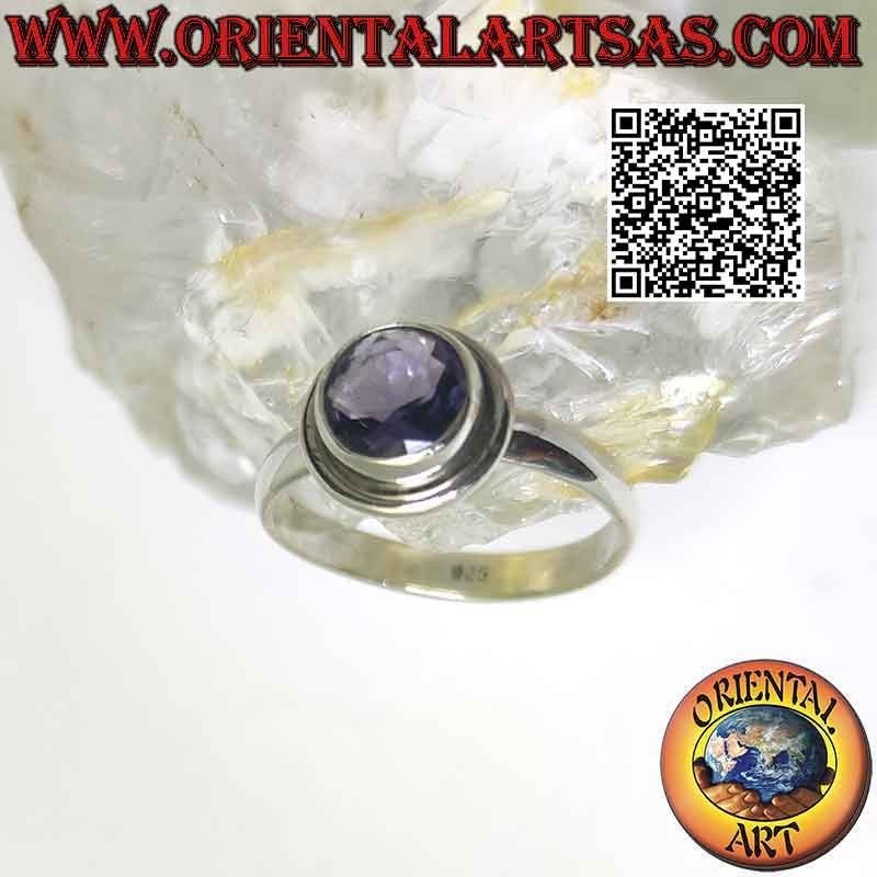 Silver ring with raised faceted round amethyst and edge