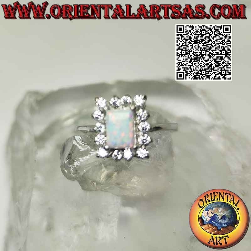 Anillo de plata con ópalo arlequín rectangular y circonitas blancas