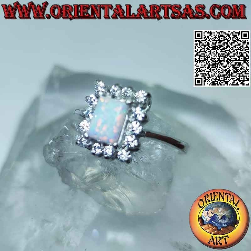 Anillo de plata con ópalo arlequín rectangular y circonitas blancas