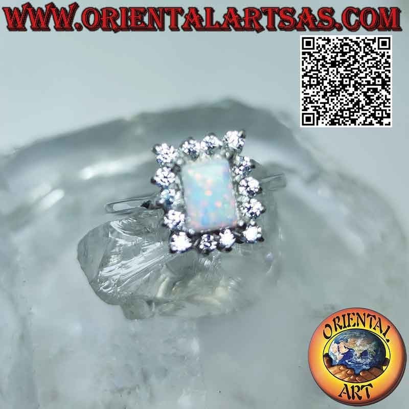 Silver ring with rectangular harlequin opal and white zircons