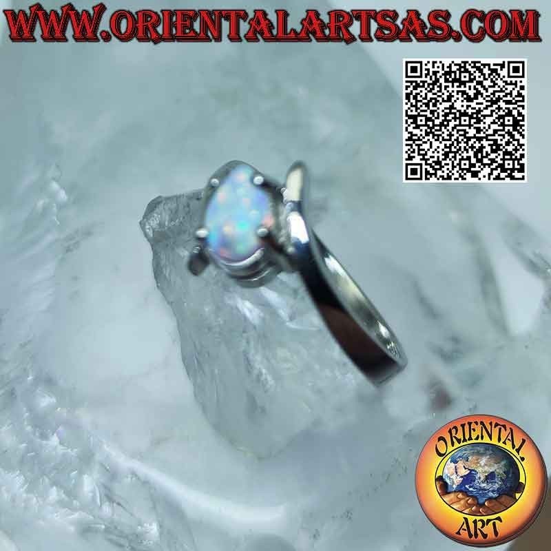 Anillo de plata con ópalo arlequín con cruz gota
