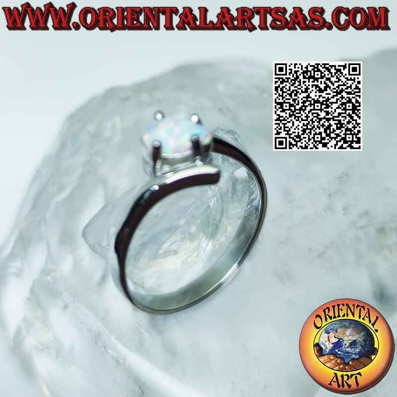 Silver ring with harlequin opal with cross drop