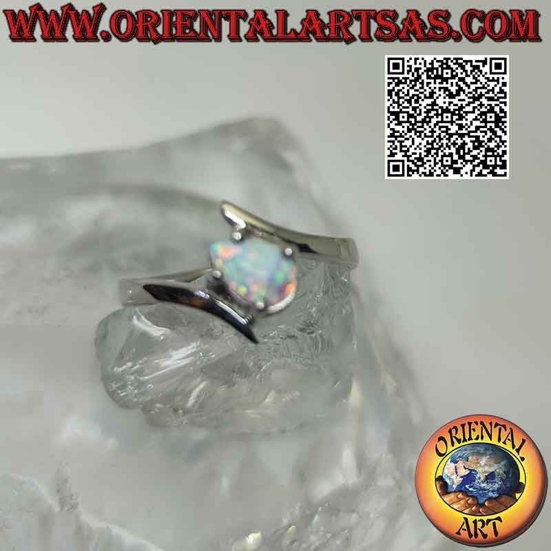 Silver ring with harlequin opal with cross drop