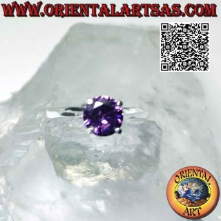 Silver ring with round faceted synthetic amethyst set on a smooth double setting