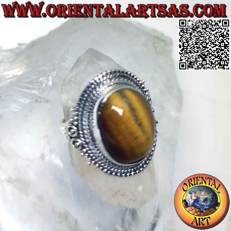 Silver ring with large tiger eye and microspheres decoration