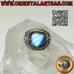 Silver ring with large square beveled cabochon labradorite surrounded by microspheres and intertwining
