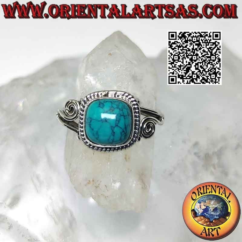 Silberring mit Cabochon-Türkis und asymmetrischer Spirale an den Seiten
