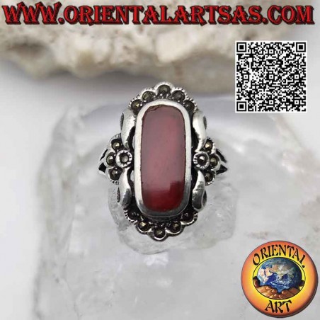 Silver ring with rounded rectangular carnelian on an elegant setting studded with marcasite
