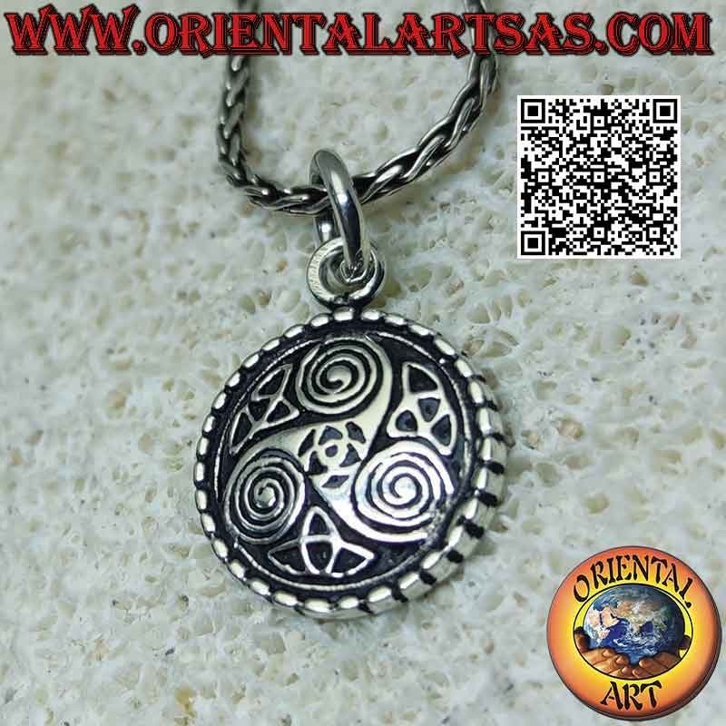 Silver pendant, medal with Triskele and three triquetra