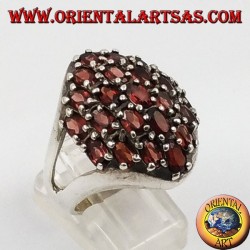 Silver ring with faceted oval natural garnets