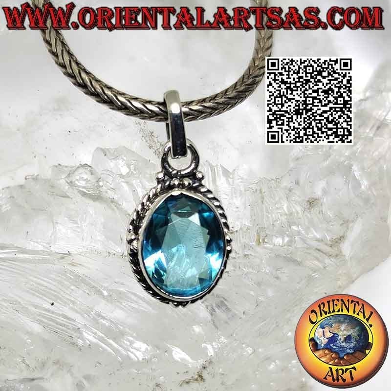 Silver pendant with faceted oval topaz, weave and balls