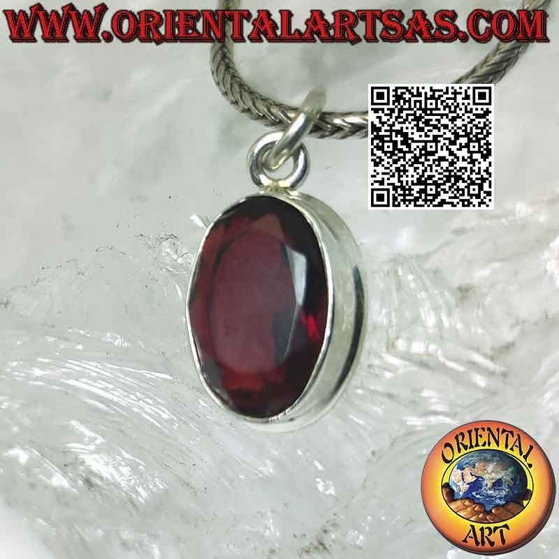 Silver pendant with oval garnet on a smooth high setting