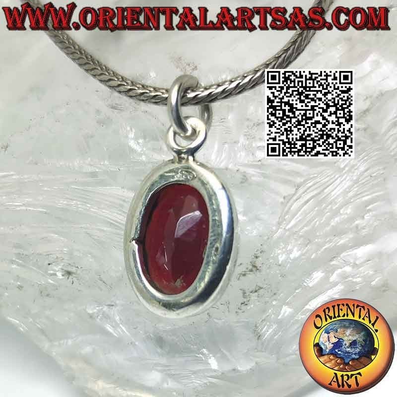 Silver pendant with oval garnet on a smooth high setting