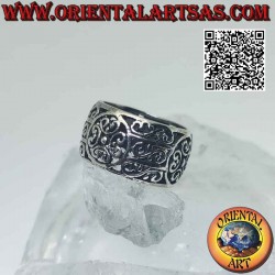 Silver ring with large rounded band with double alternating perforated floral decoration