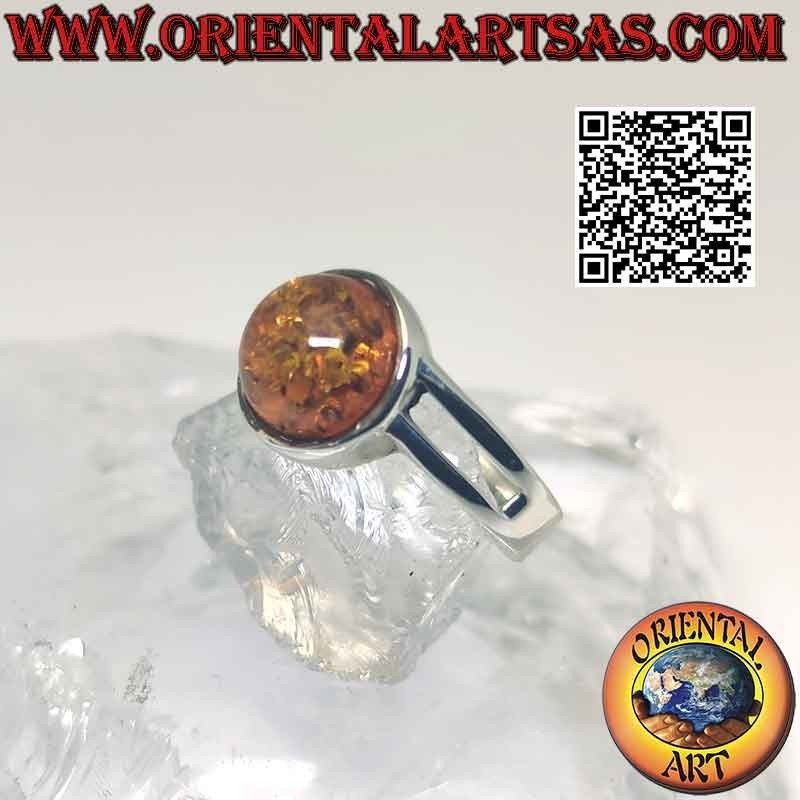 Bague en argent avec cabochon rond ambre et double crochet asymétrique