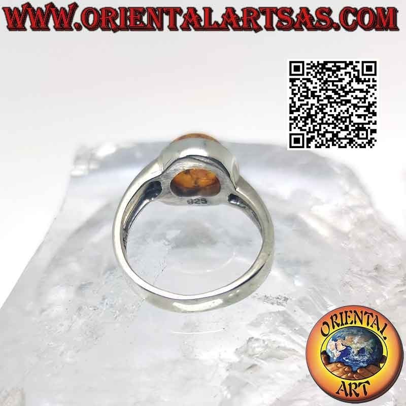 Silver ring with round cabochon amber and double asymmetrical hook