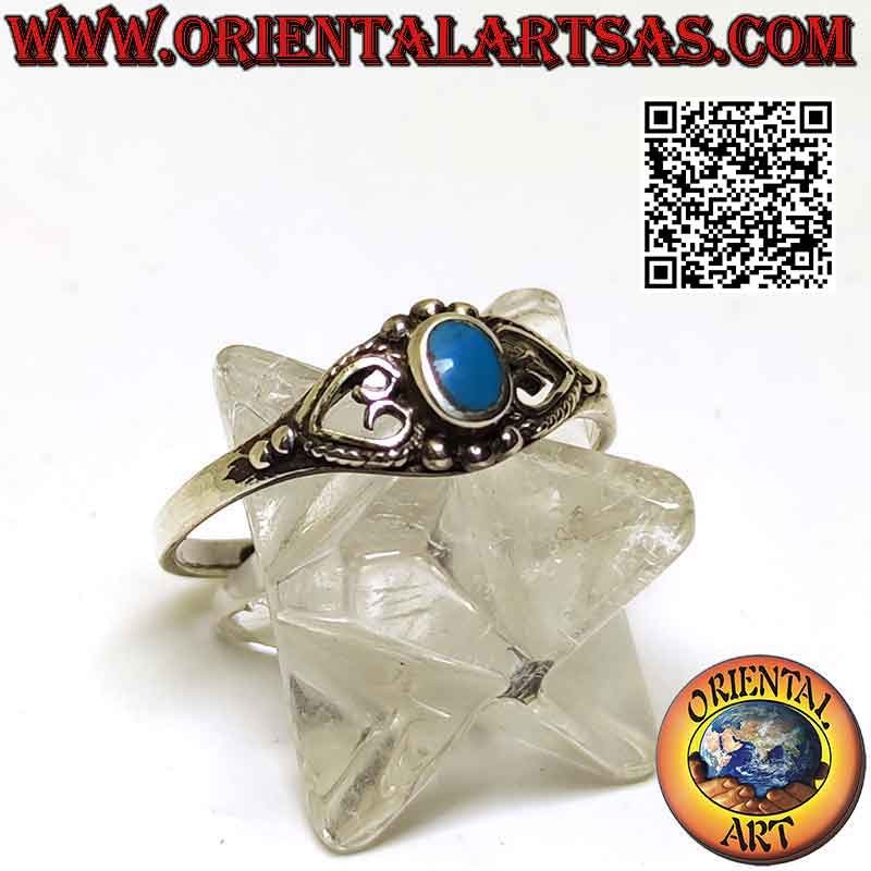 Bague en argent avec petite turquoise ovale entre coeur percé
