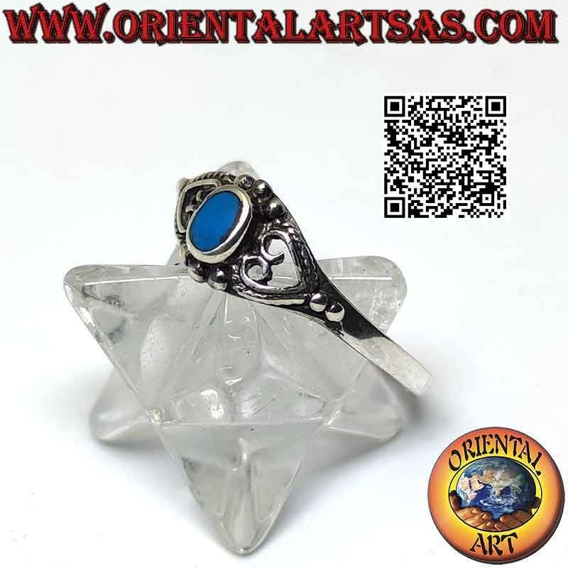 Bague en argent avec petite turquoise ovale entre coeur percé