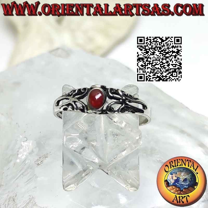 Silver ring with small oval carnelian and openwork decorations