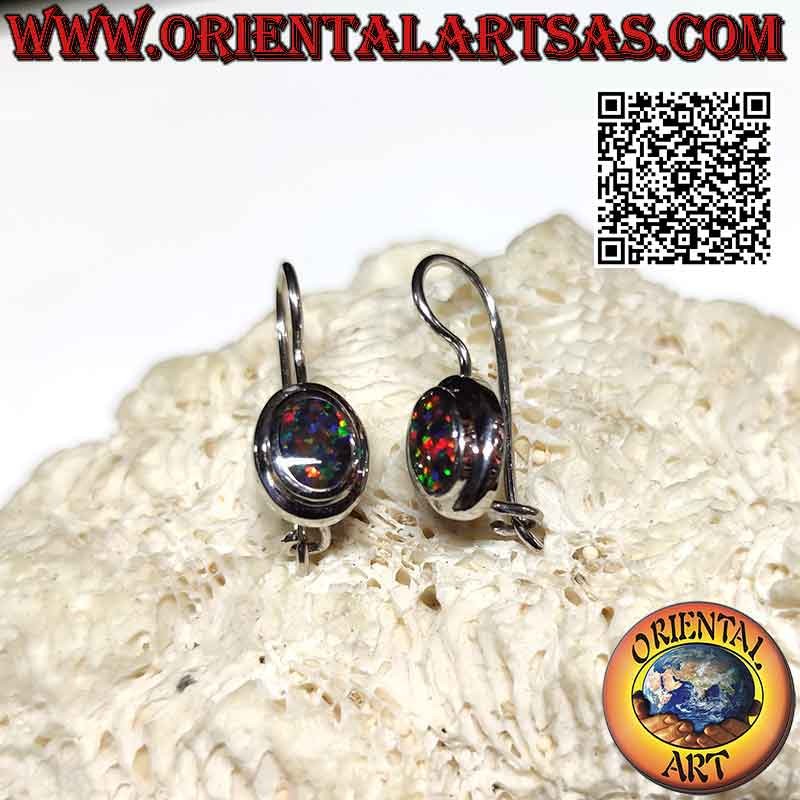 Silver earrings with oval fire opal flush with the edge and thick smooth edge