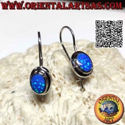 Silver earrings with oval blue mystic opal flush with edge and thick smooth edge