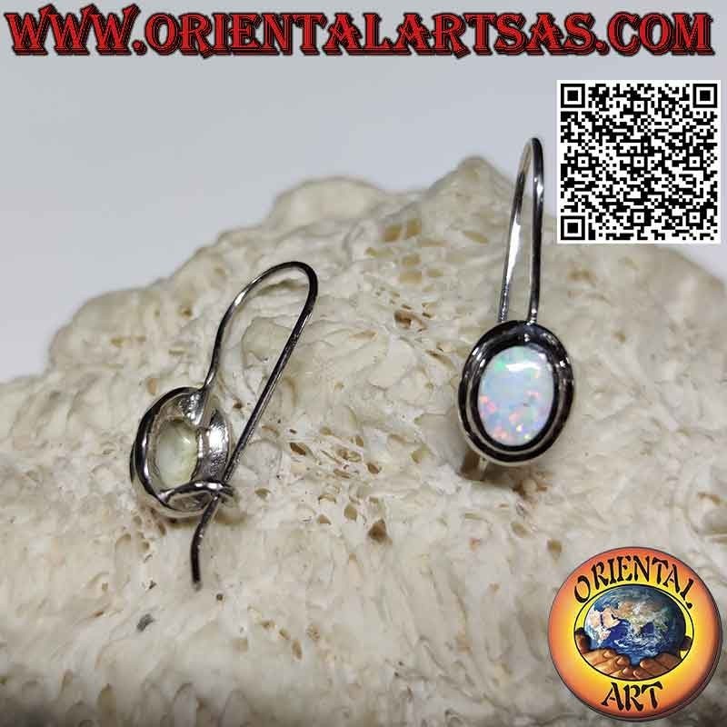 Silver earrings with oval harlequin opal with smooth edge