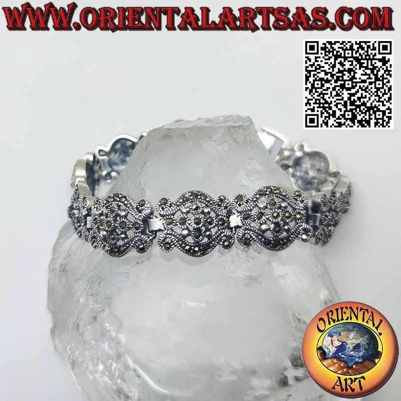 Bracciale in argento 925‰ con onde con fiore centrale e marcassite