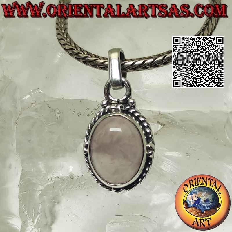 Silver pendant with oval cabochon rose quartz surrounded by intertwining and ball on the cardinal points