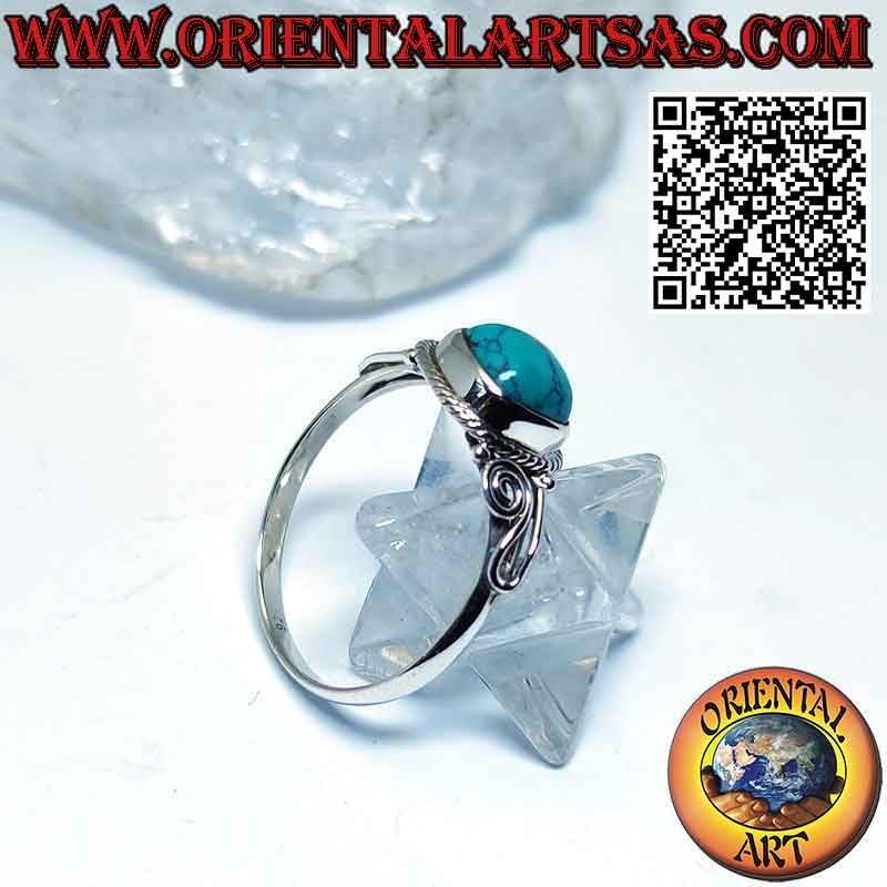 Silver ring with cabochon turquoise decorated with intertwining and spiral