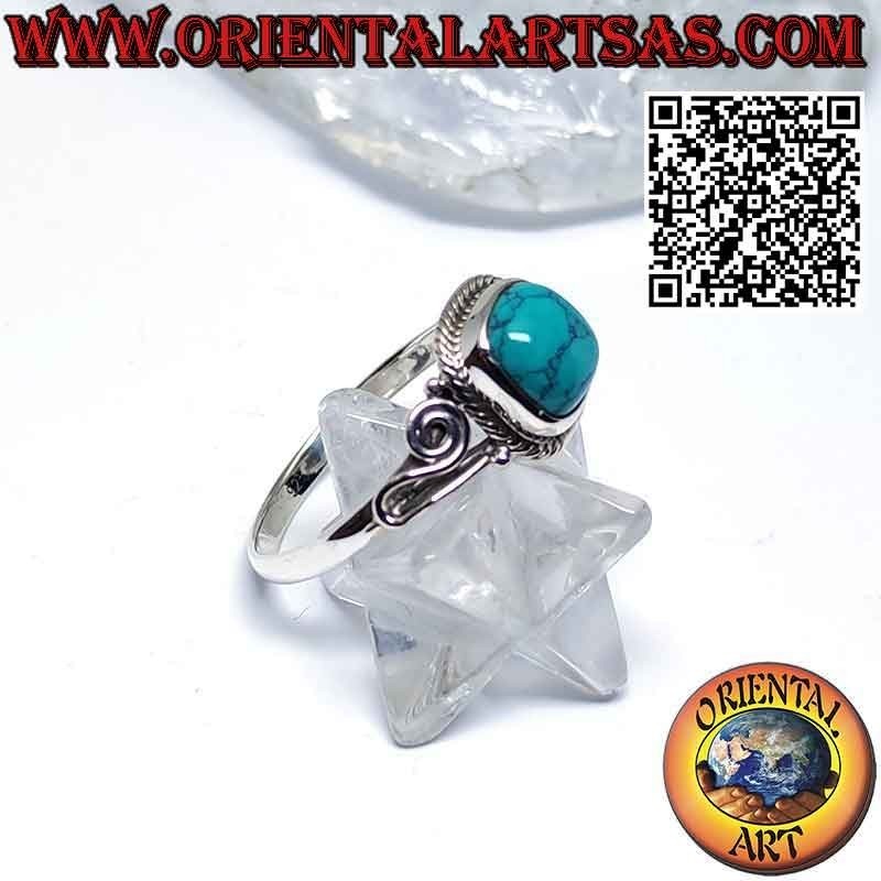 Anello in argento con turchese cabochon ornata da intreccio e spirale