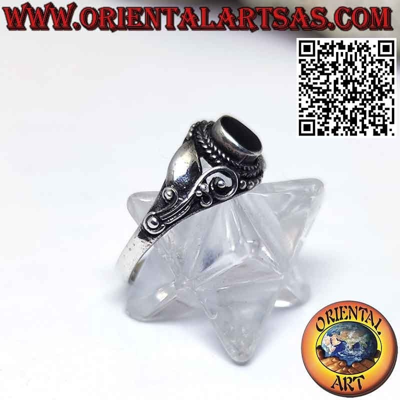 Silver ring with oval onyx and decorated with lilac flowers on the sides