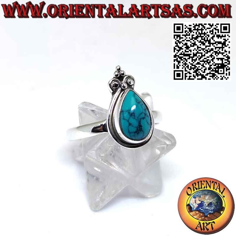 Bague en argent avec turquoise gouttelette à bord lisse et couronne de lys