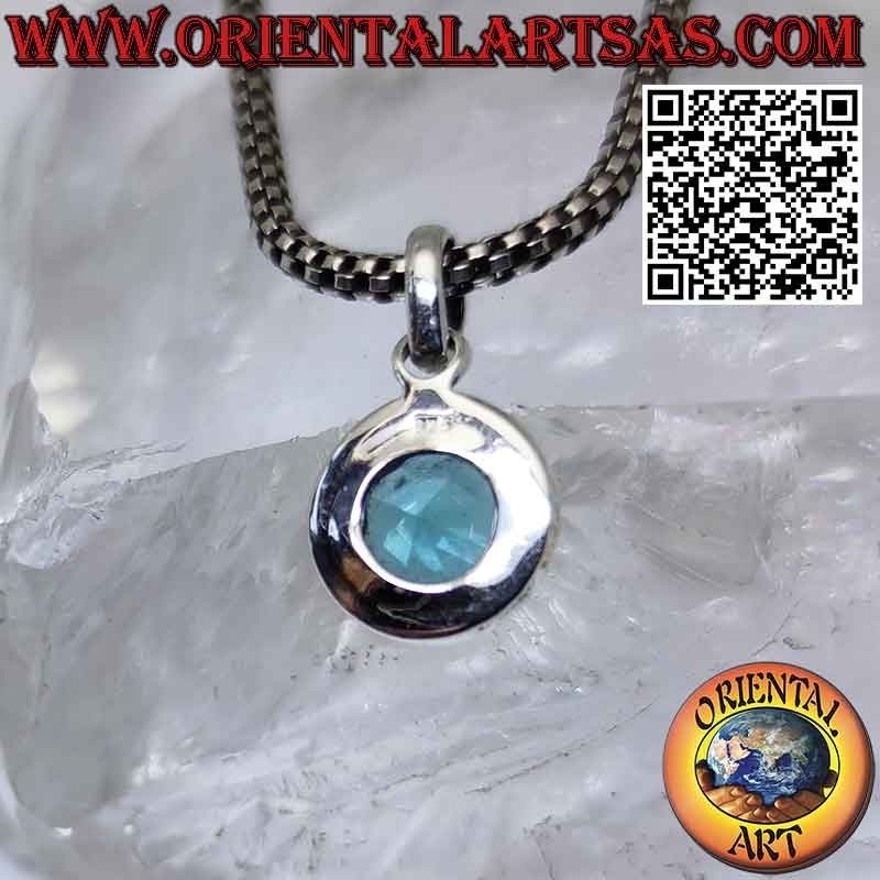 Silver pendant with faceted round blue topaz with simple edge