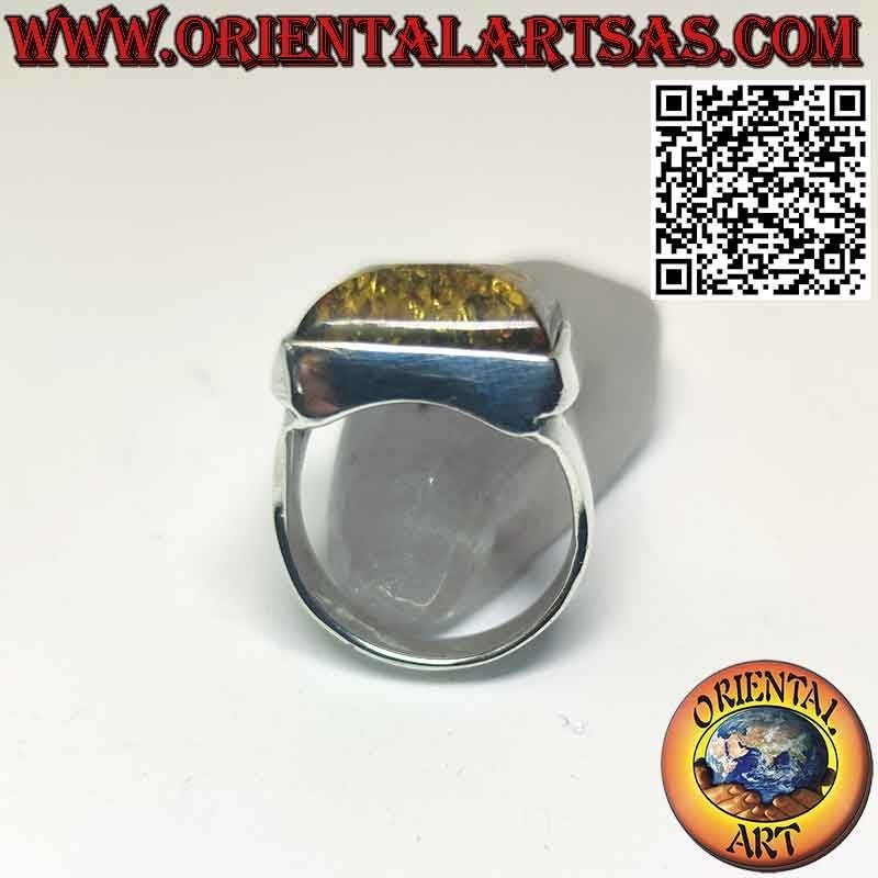 Rectangular silver ring with a large green Baltic amber