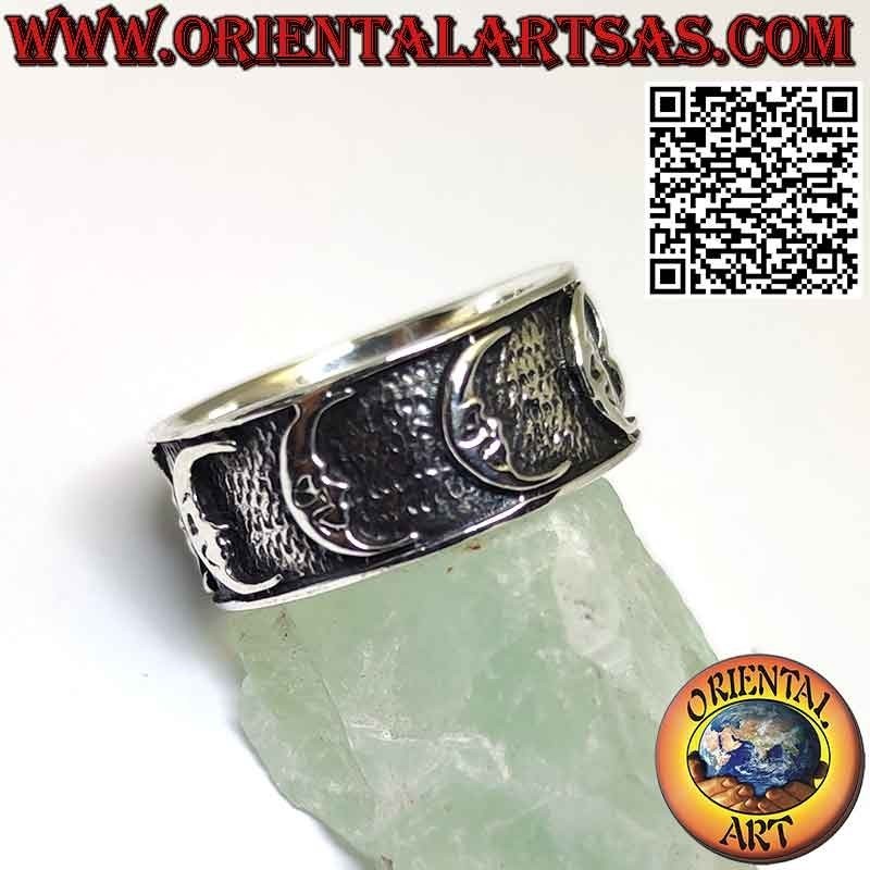 Wide band silver ring with high relief moons
