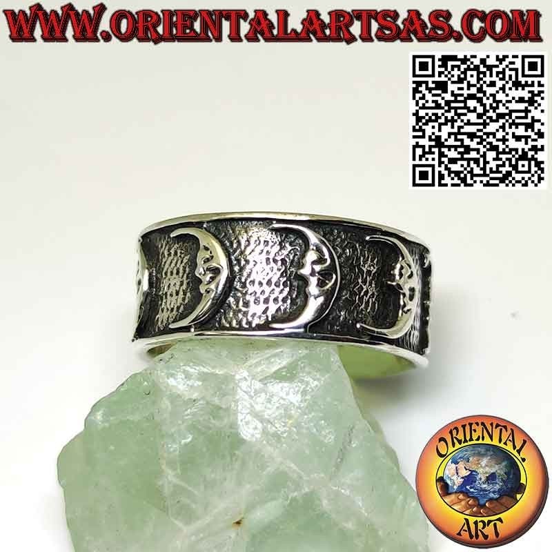 Wide band silver ring with high relief moons
