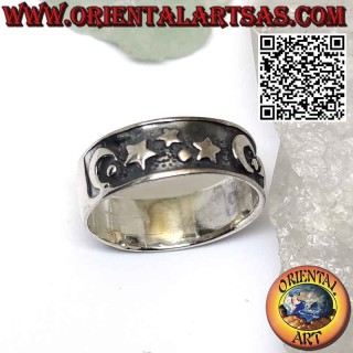 Wide band silver ring with high relief moons and stars