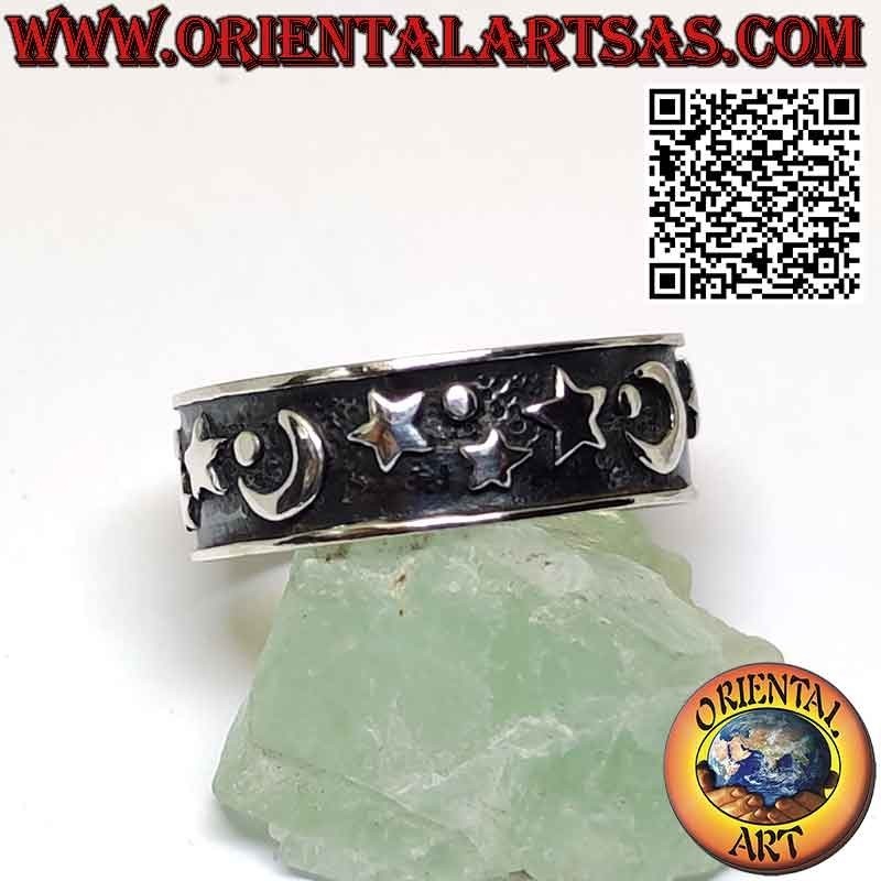 Wide band silver ring with high relief moons and stars