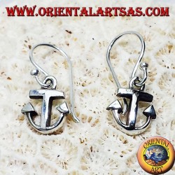 Silver earrings, still simple