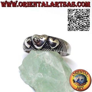 Silver ring with three hearts ascending and descending in high relief