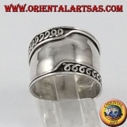 Silver wide band ring, Bali with asymmetric machined edges
