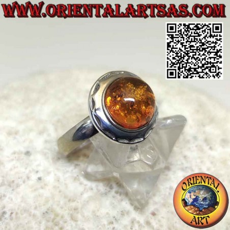 Silver ring with round hemispherical Baltic amber and solar edge