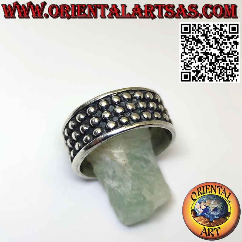 Wide band silver ring with three rows of ball studs