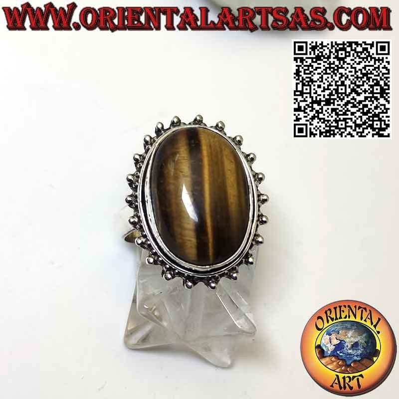 Anillo de flores de plata con gran ojo de tigre cabujón ovalado rodeado de puntos