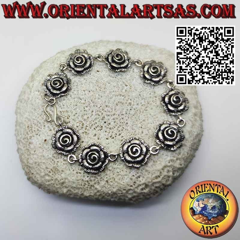 Bracelet in 925 ‰ silver composed of nine beautiful large roses
