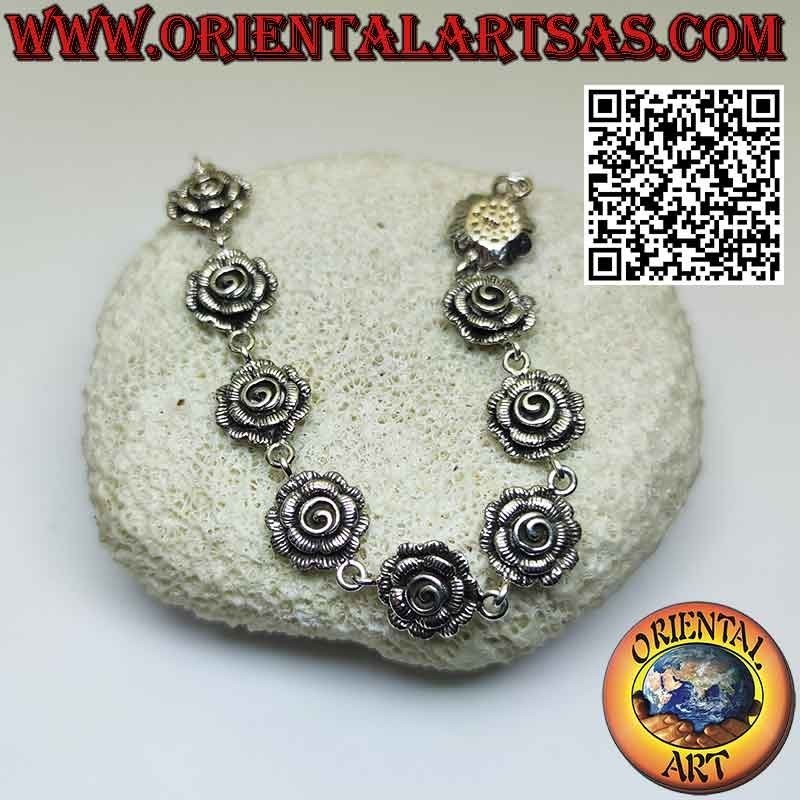 Bracelet in 925 ‰ silver composed of nine beautiful large roses