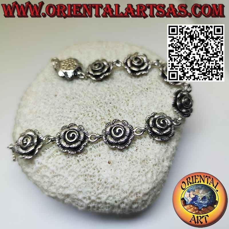 Bracelet in 925 ‰ silver composed of nine beautiful large roses