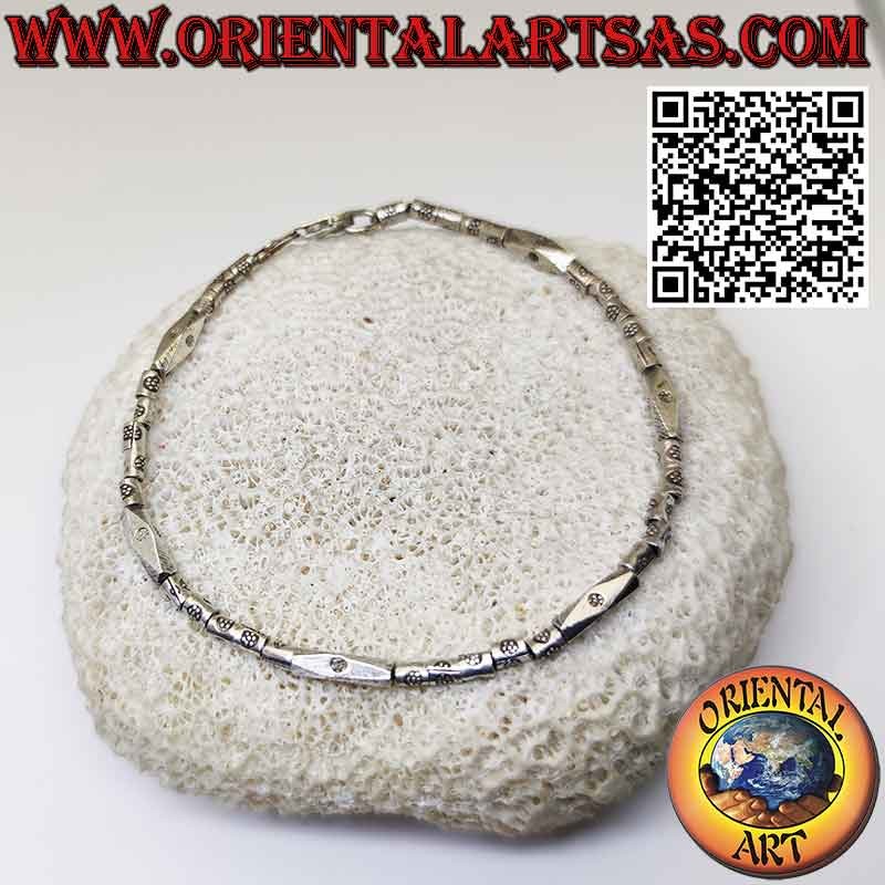 Pulsera de plata con cilindros roscados y prisma realizada por Karen