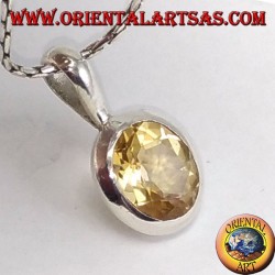 Silver pendant with embedded oval natural topaz